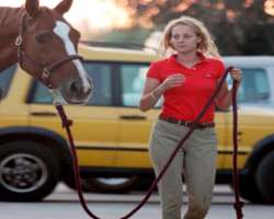 She was champion equestrienne as a child and still enjoys horse rides.